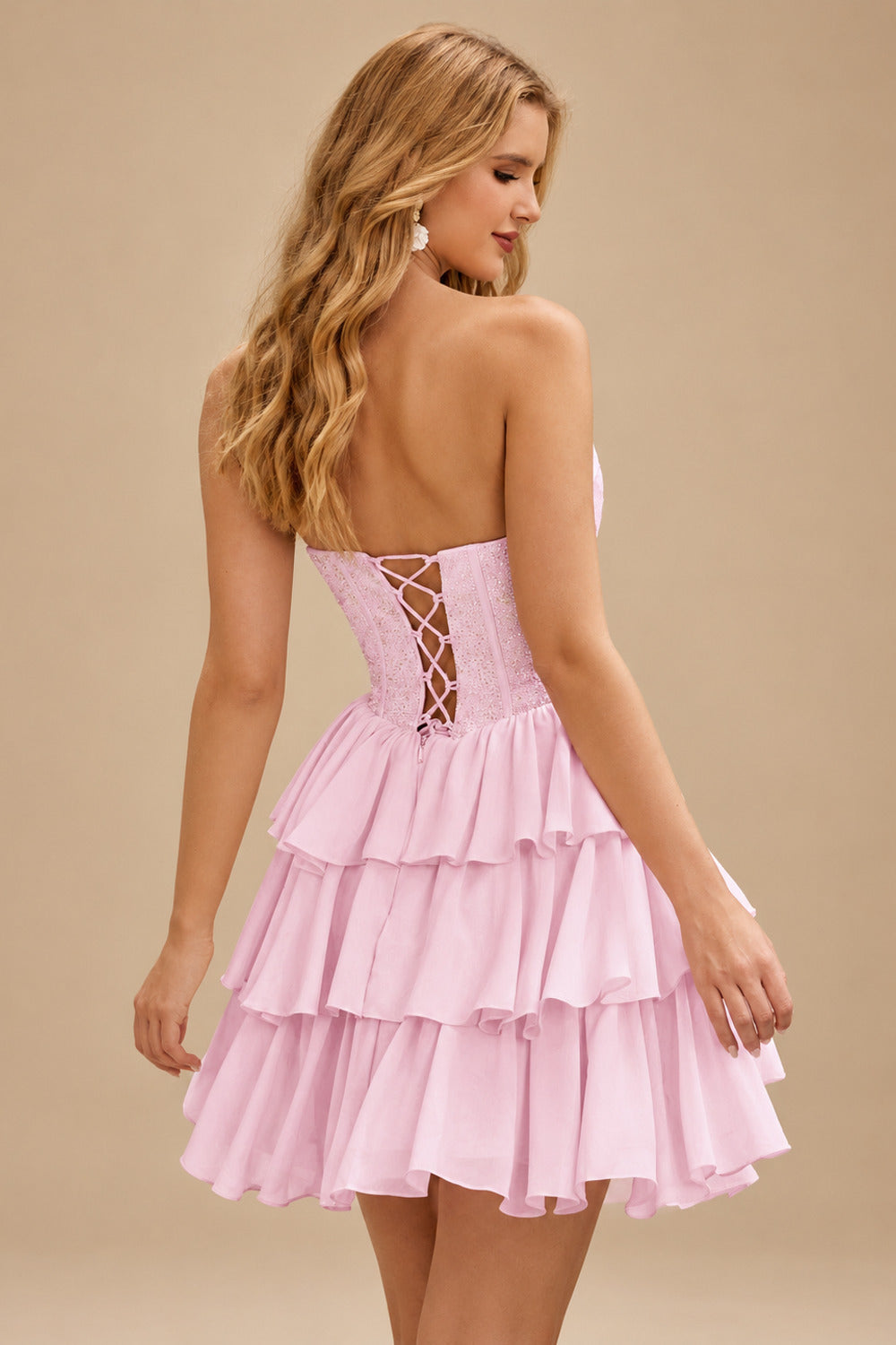 Rutipo Blushing Pink A-line Strapless Tiered Ruffle Homecoming Dress with Beaded Ruching Corset